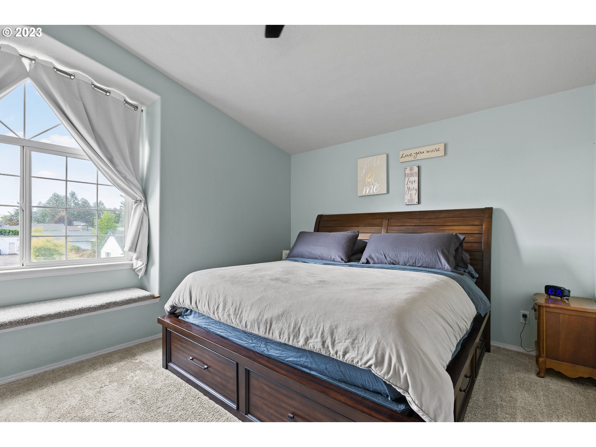 3659 Southeast 10th Street Gresham, OR 97080 - Photo 12 of 34 a bedroom with a bed and a window