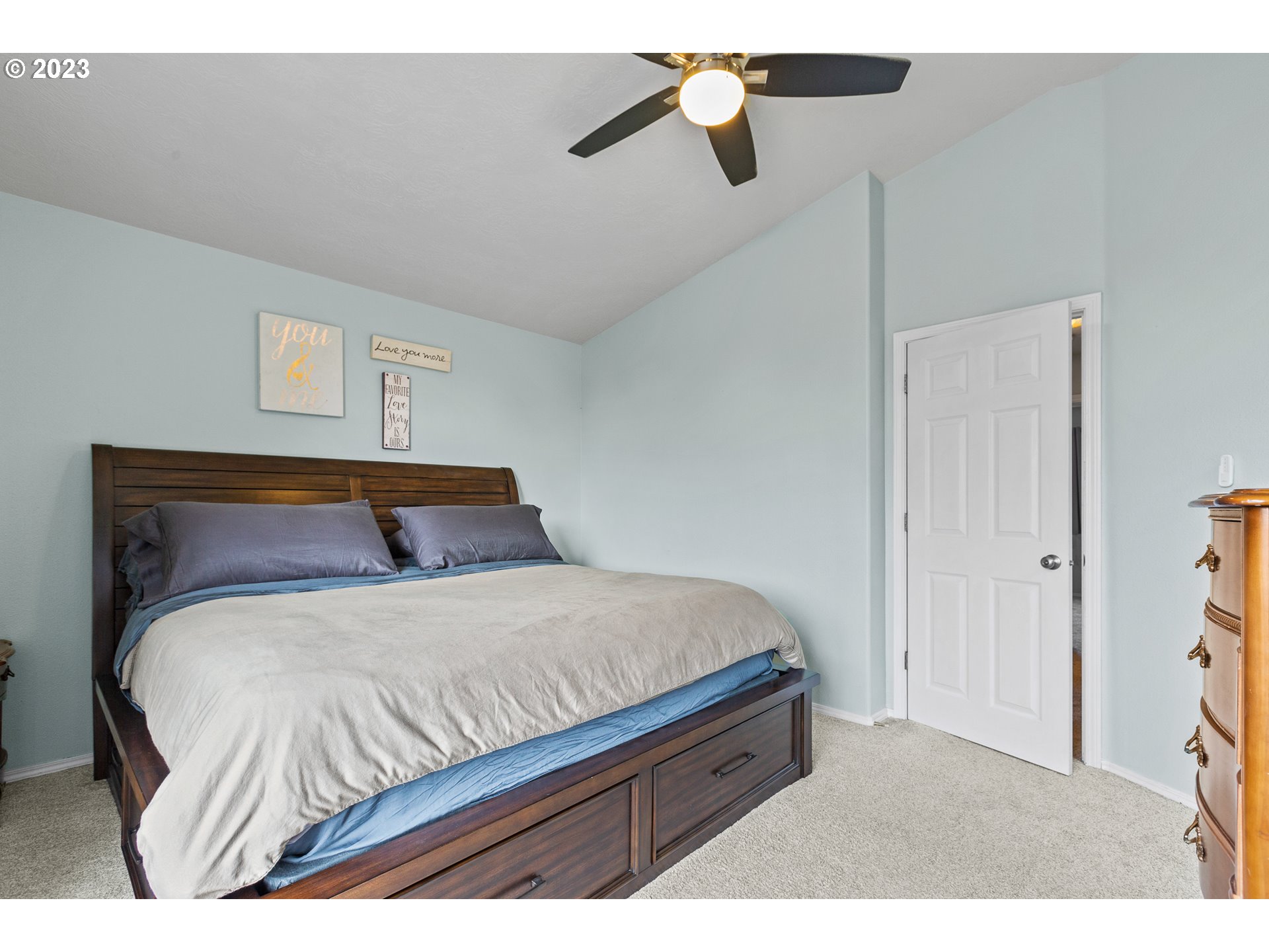 3659 Southeast 10th Street Gresham, OR 97080 - Photo 13 of 34 a bedroom with a bed and a ceiling fan