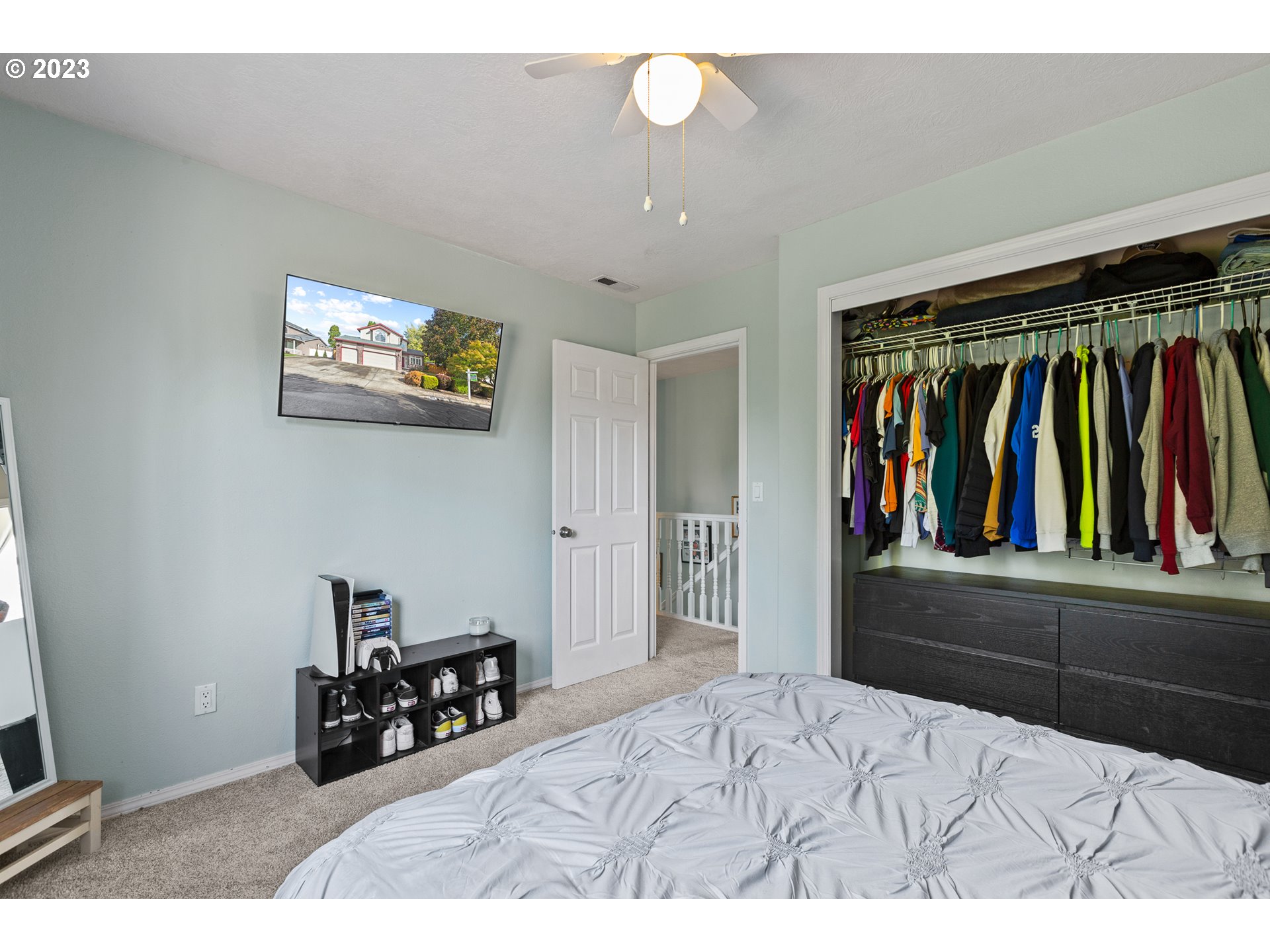 3659 Southeast 10th Street Gresham, OR 97080 - Photo 15 of 34 a bedroom with furniture and a large mirror