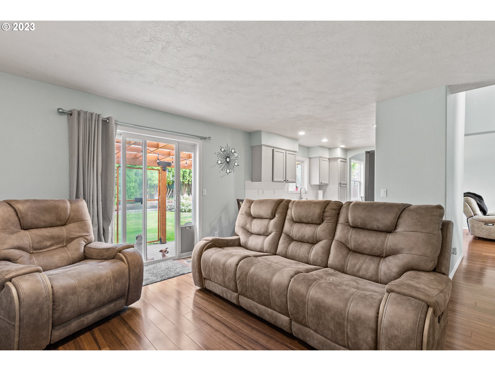 3659 Southeast 10th Street Gresham, OR 97080 - Photo 21 of 34 a living room with furniture and a large window
