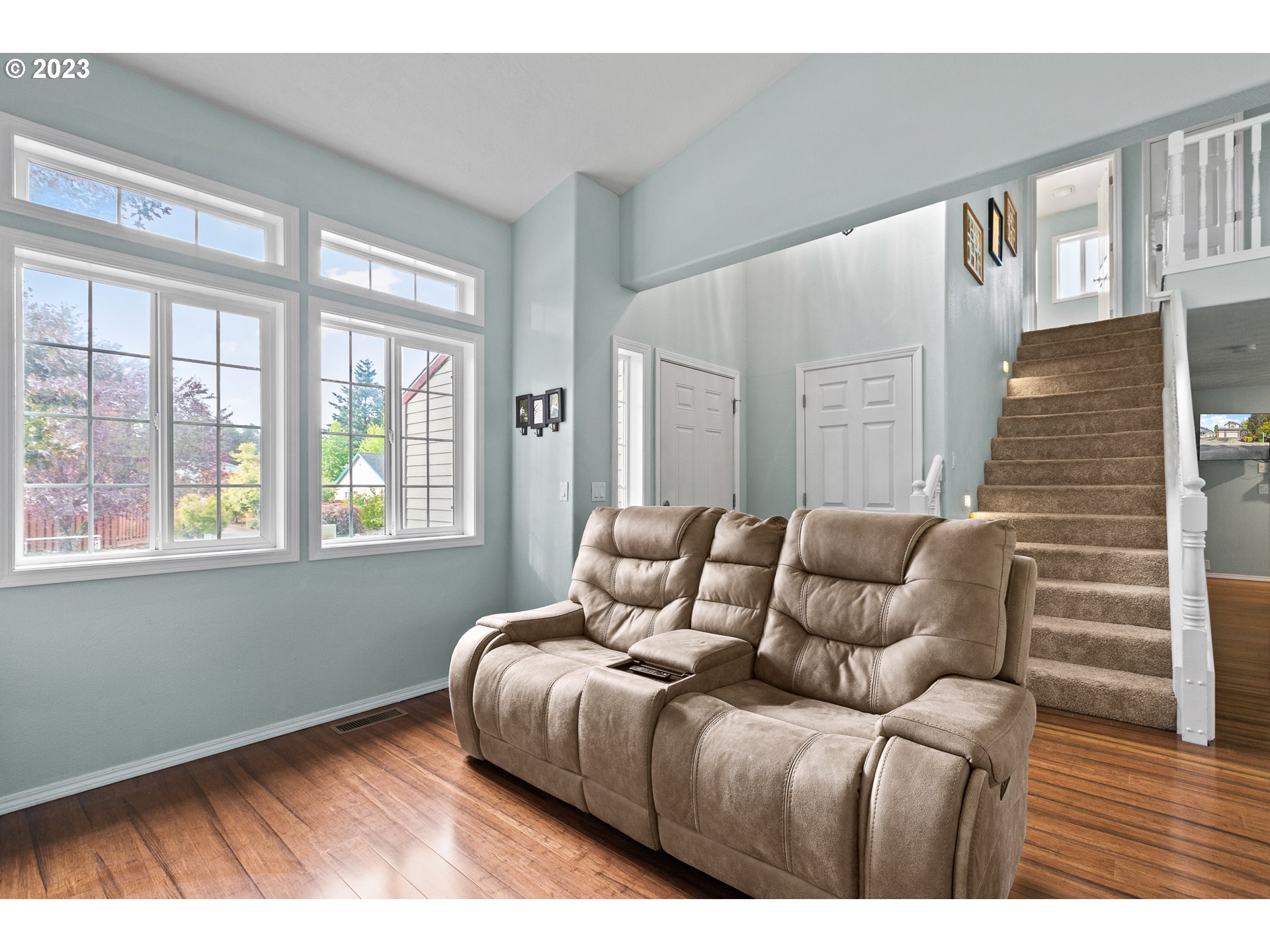 3659 Southeast 10th Street Gresham, OR 97080 - Photo 24 of 34 a bedroom with a bed and wooden floor