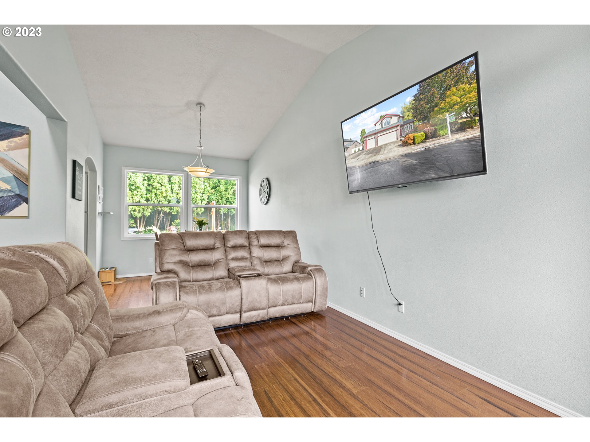 3659 Southeast 10th Street Gresham, OR 97080 - Photo 25 of 34 a living room with furniture and a flat screen tv