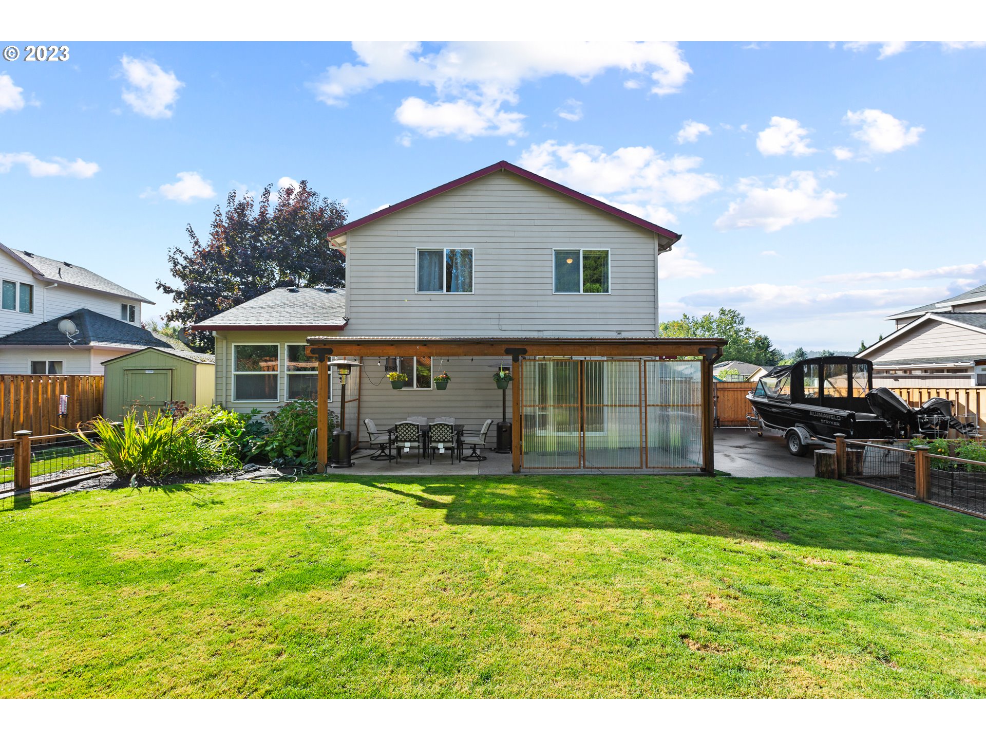 3659 Southeast 10th Street Gresham, OR 97080 - Photo 28 of 34 a view of a house with a yard and sitting area