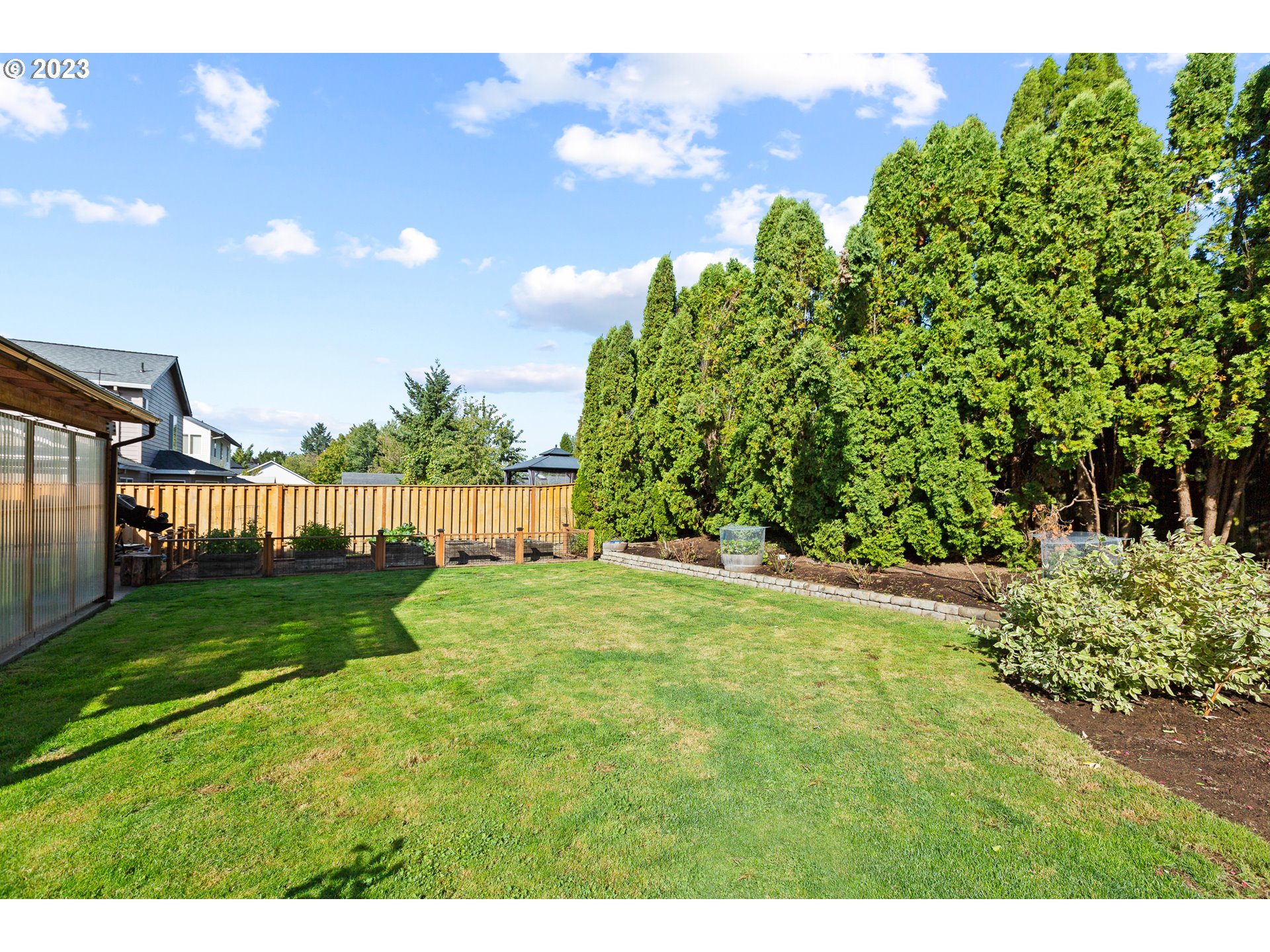 3659 Southeast 10th Street Gresham, OR 97080 - Photo 33 of 34 a view of a backyard with garden