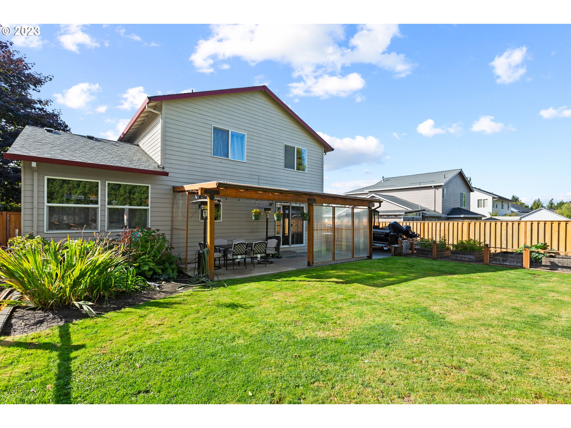 3659 Southeast 10th Street Gresham, OR 97080 - Photo 34 of 34 a view of a house with a yard porch and sitting area