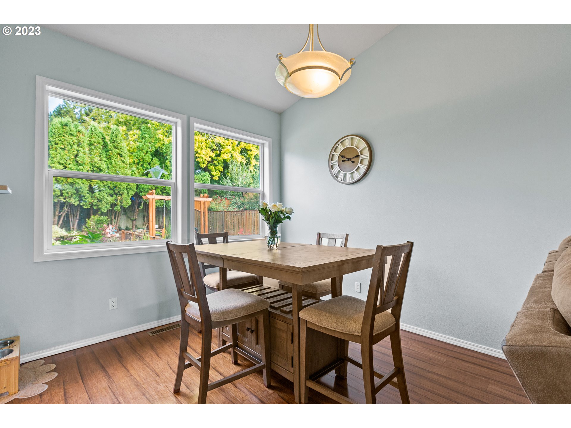 3659 Southeast 10th Street Gresham, OR 97080 - Photo 9 of 34 a view of a dining room with furniture and a window