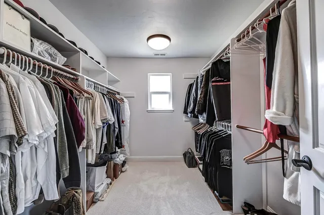 a view of outdoor space with green field and trees