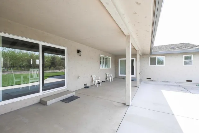 a view of a yard with an outdoor space