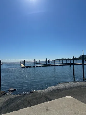 a front view of a house with lake view