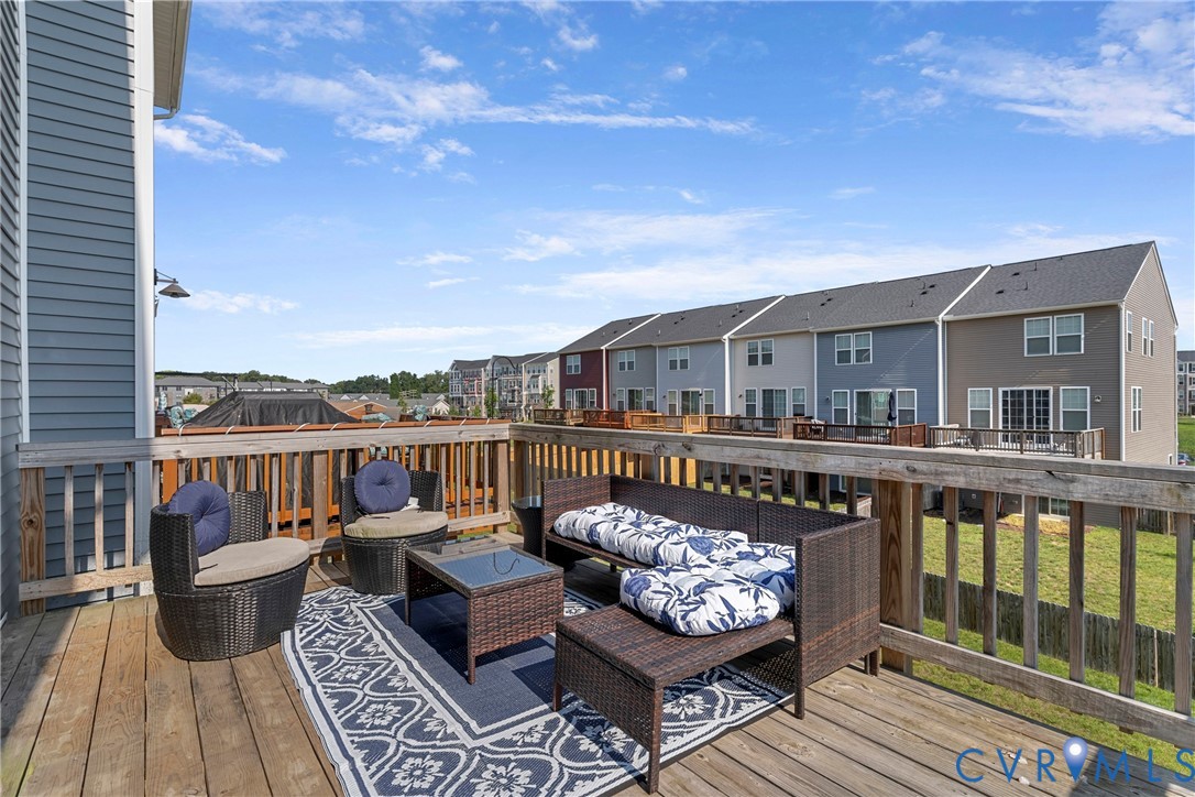640 Rivanna Hill Road Glen Allen, VA 23060 - Photo 32 of 37 Wood deck with a slatted railing