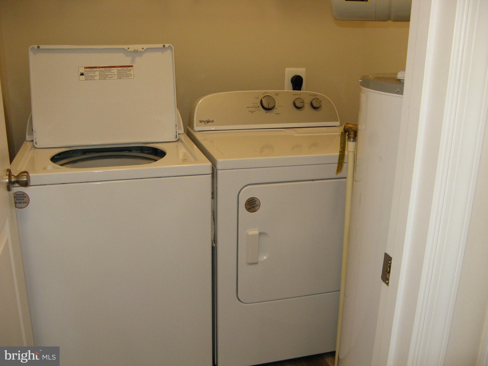 57 Oak Lane Colonial Beach, VA 22443 - Photo 34 of 47 a utility room with dryer and washer