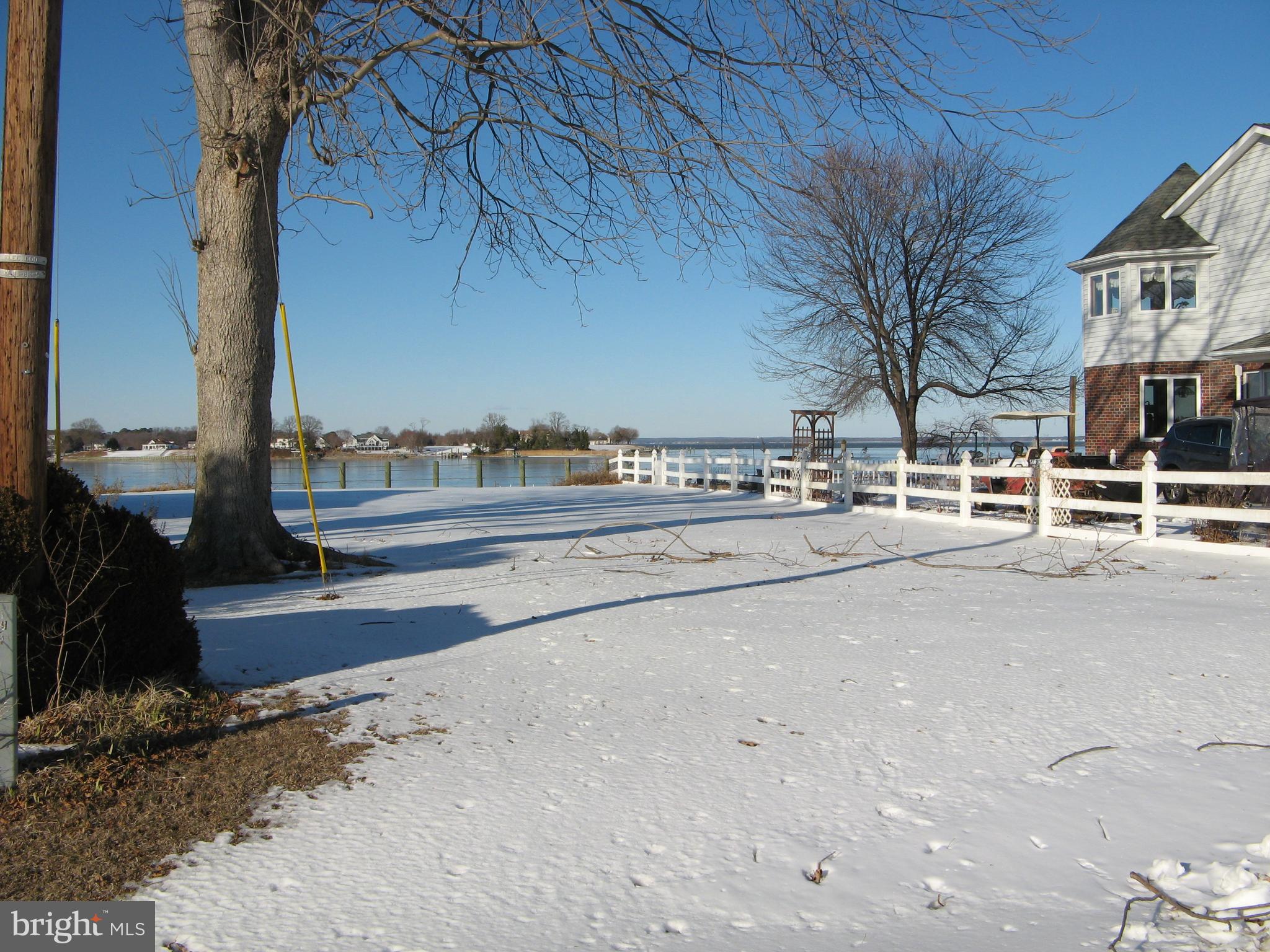 57 Oak Lane Colonial Beach, VA 22443 - Photo 44 of 47 a view of a street with an trees