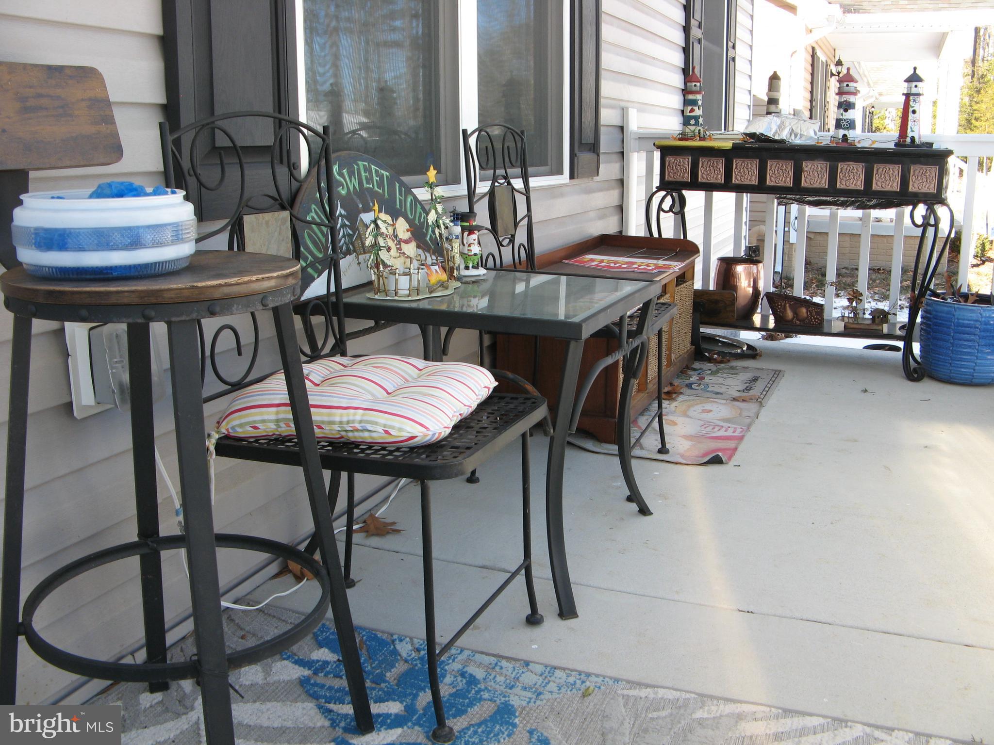 57 Oak Lane Colonial Beach, VA 22443 - Photo 8 of 47 a view of a dining room with furniture and window
