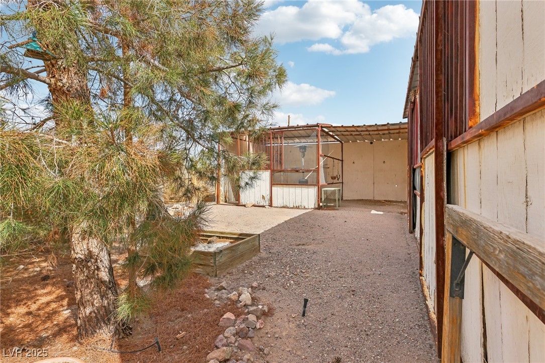 519 North Racetrack Road Henderson, NV 89015 - Photo 80 of 98 View of yard featuring an outbuilding