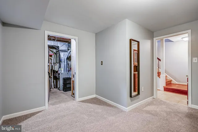 a bathroom with a sink vanity and a mirror