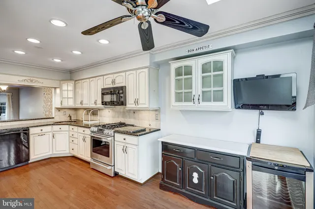 a kitchen with a stove and a microwave