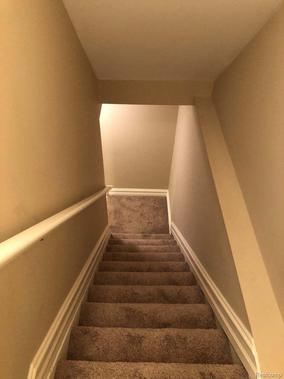 30650 Inkster Road Franklin, MI 48025 - Photo 29 of 41 Hallwayand Stairs to the lower level