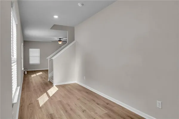 a view of entryway with wooden floor