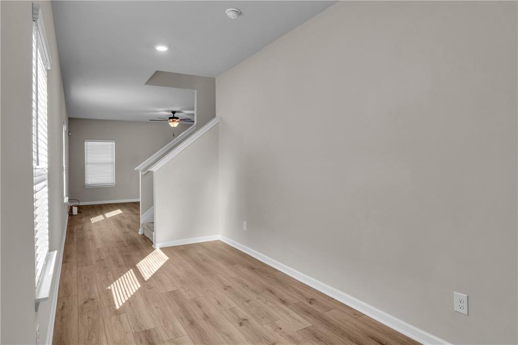 11608 Winston Way Hampton, GA 30228 - Photo 2 of 16 a view of entryway with wooden floor