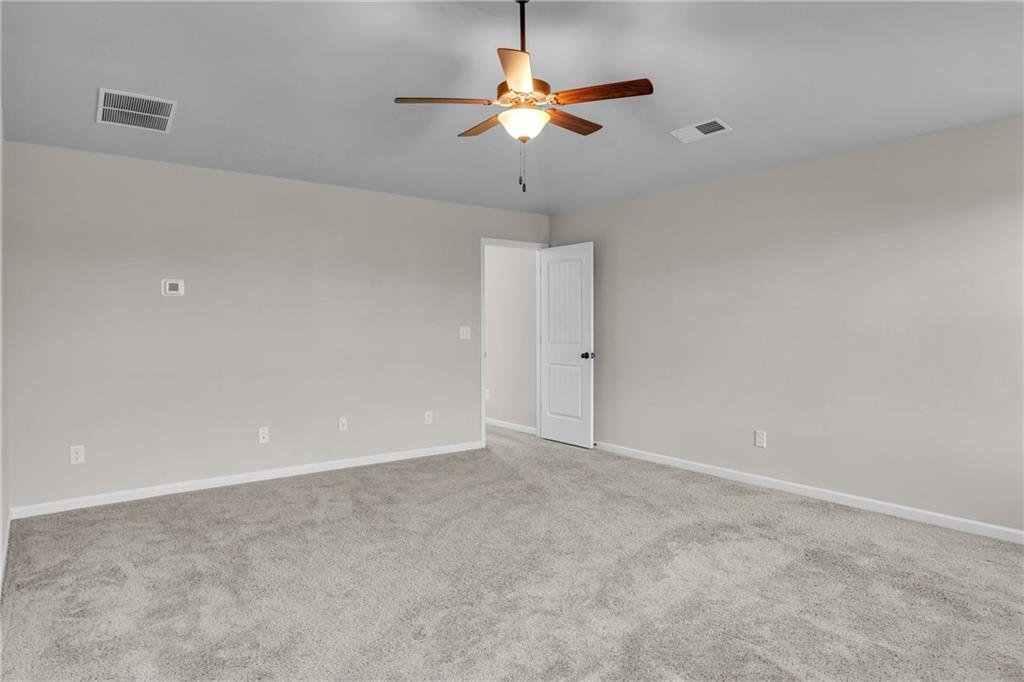 11608 Winston Way Hampton, GA 30228 - Photo 6 of 16 a view of an empty room