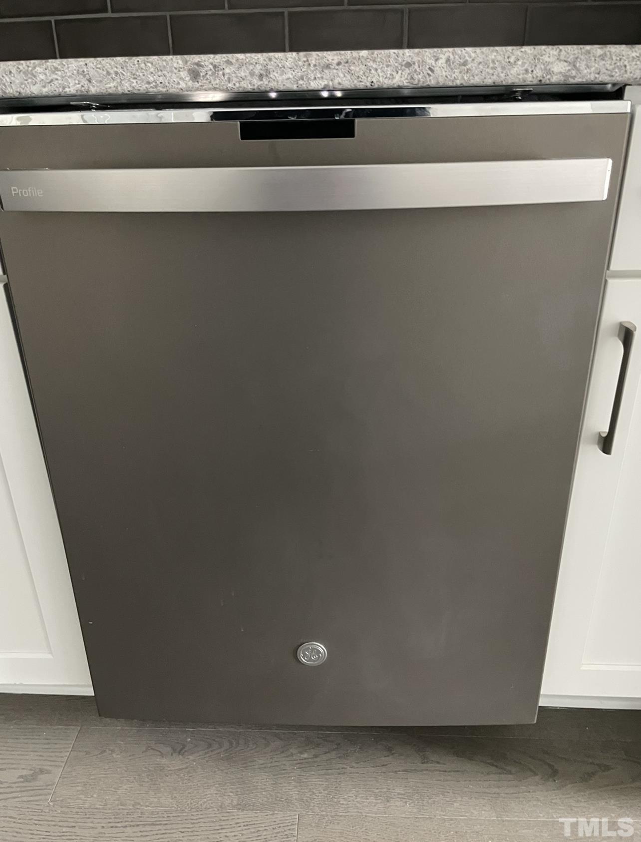 105 Chatham Walk Lane, Unit 404 Cary, NC 27511 - Photo 27 of 33 a close up of a microwave