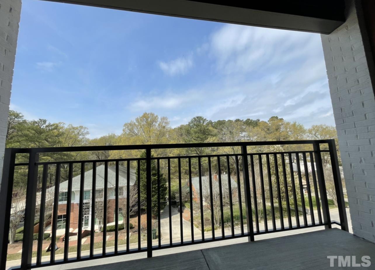 105 Chatham Walk Lane, Unit 404 Cary, NC 27511 - Photo 31 of 33 a view of city from a balcony