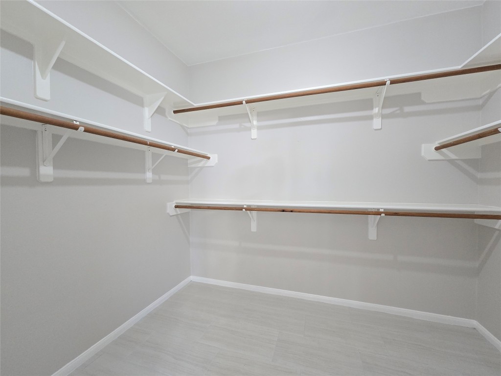 18819 Harbor Key Circle Houston, TX 77084 - Photo 11 of 33 a view of a room with racks on the wall