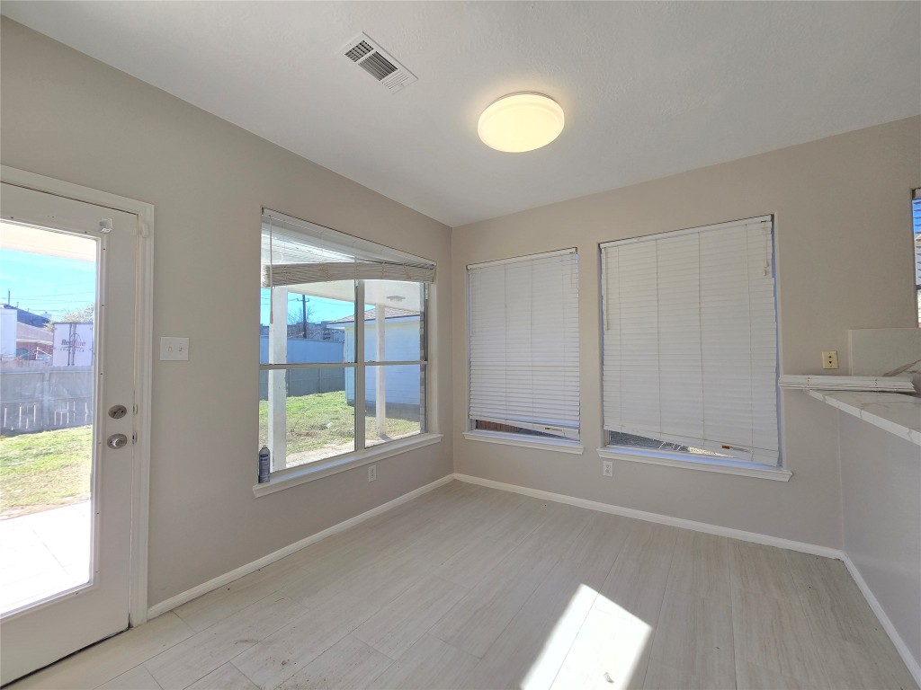 18819 Harbor Key Circle Houston, TX 77084 - Photo 13 of 33 an empty room with windows