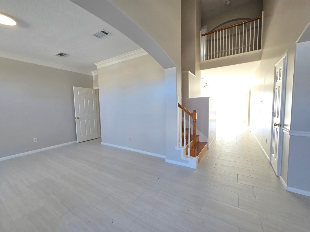 18819 Harbor Key Circle Houston, TX 77084 - Photo 29 of 33 a view of a hallway with staircase