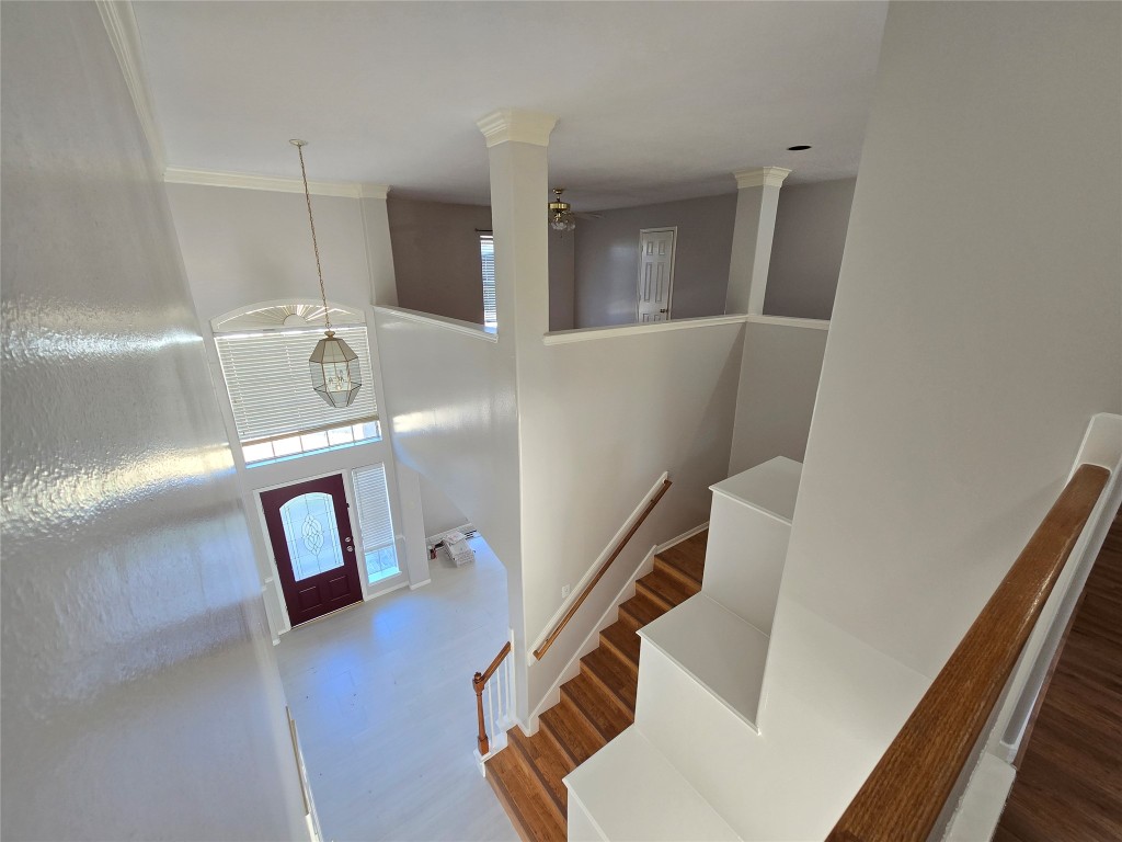 18819 Harbor Key Circle Houston, TX 77084 - Photo 30 of 33 a view of a hallway with entryway wooden floor and front door