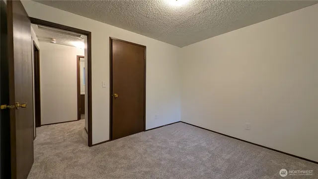an empty room with closet
