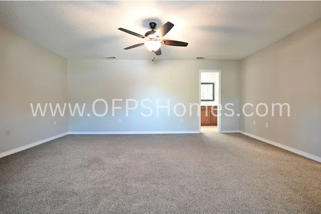 a bathroom with a sink vanity and mirror