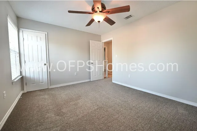 a view of backyard with tree