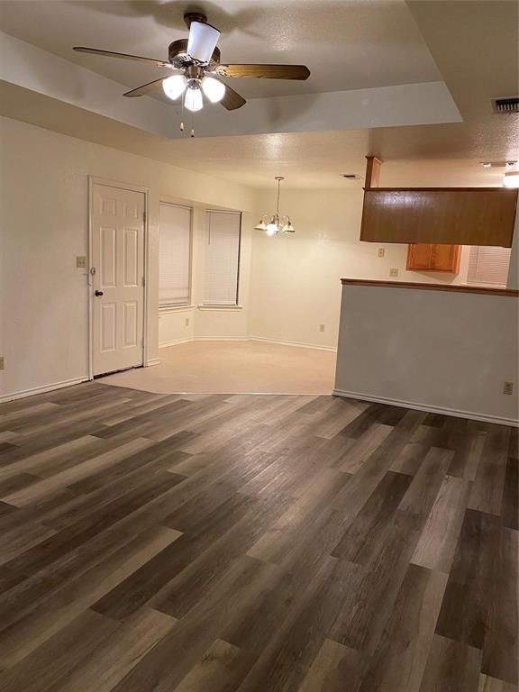 1518 Cherry Street Gainesville, TX 76240 - Photo 2 of 5 wooden floor in an empty room