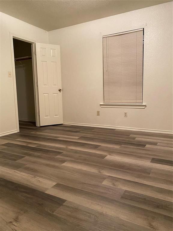 1518 Cherry Street Gainesville, TX 76240 - Photo 4 of 5 a view of a livingroom with wooden floor