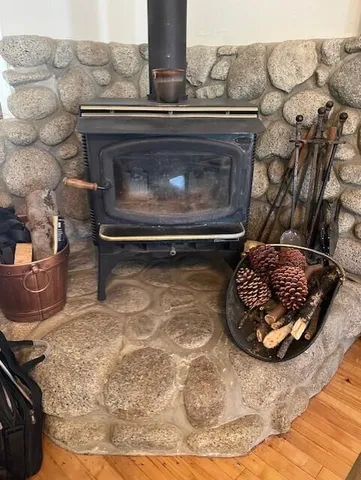 a stove top oven sitting inside of a kitchen