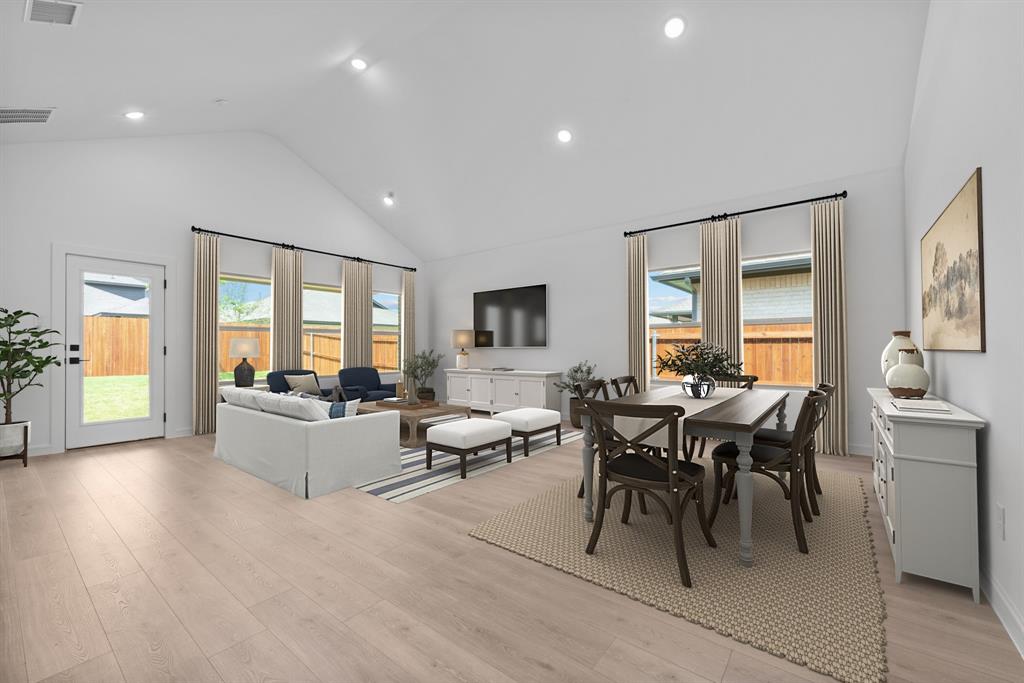 2209 Maple Ridge Drive Van Alstyne, TX 75495 - Photo 13 of 22 a living room with furniture and wooden floor