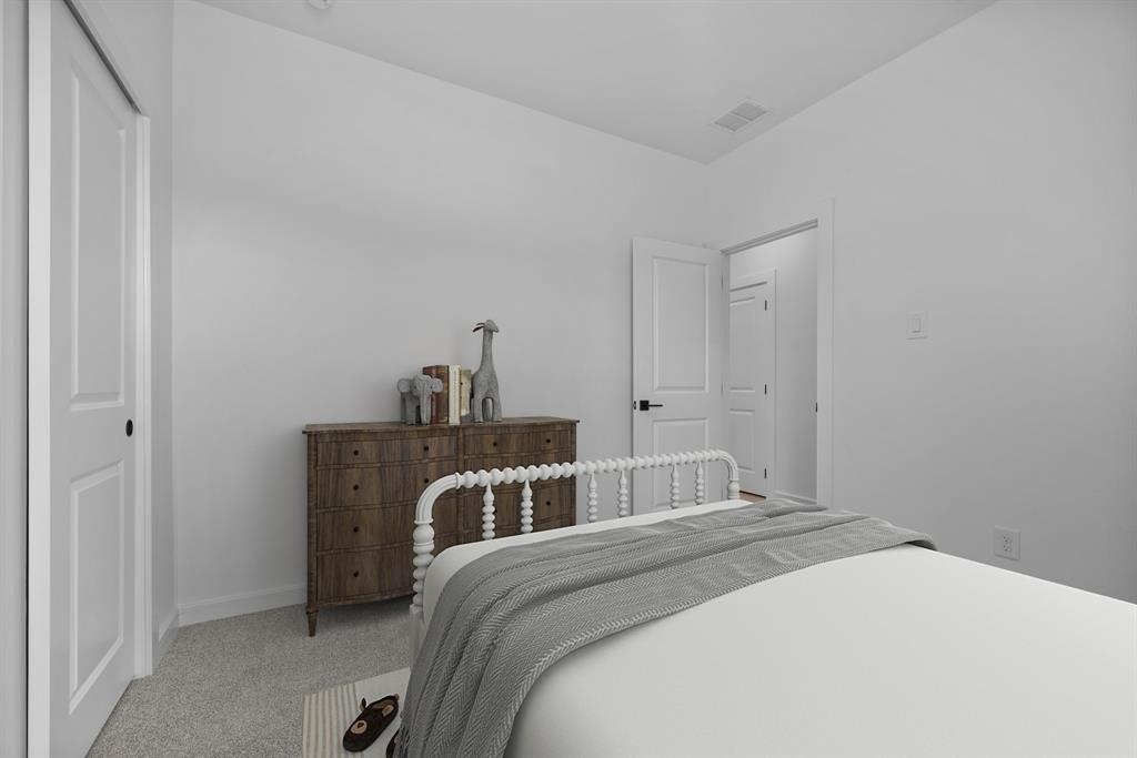 2209 Maple Ridge Drive Van Alstyne, TX 75495 - Photo 17 of 22 a bedroom with a bed and a desk