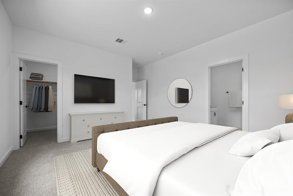 2209 Maple Ridge Drive Van Alstyne, TX 75495 - Photo 3 of 22 a bedroom with a bed and a flat screen tv