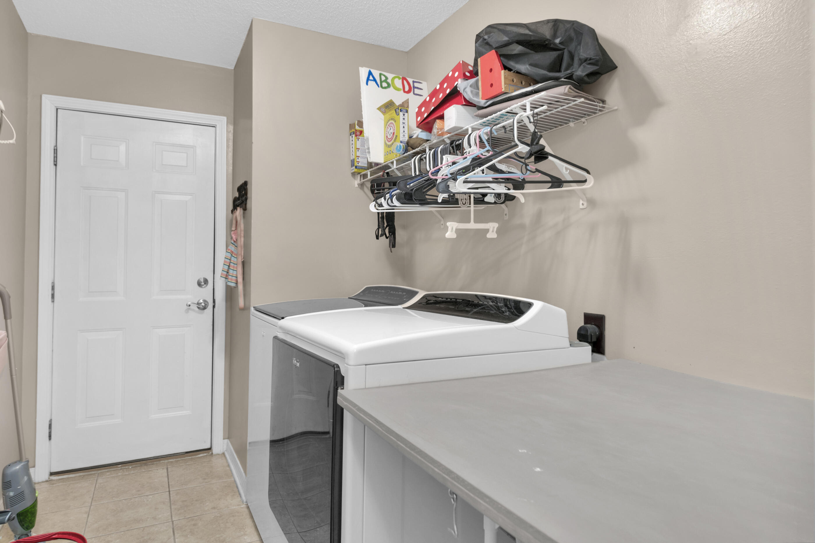 6215 Shire Lane Crestview, FL 32536 - Photo 28 of 36 a utility room with dryer and washer