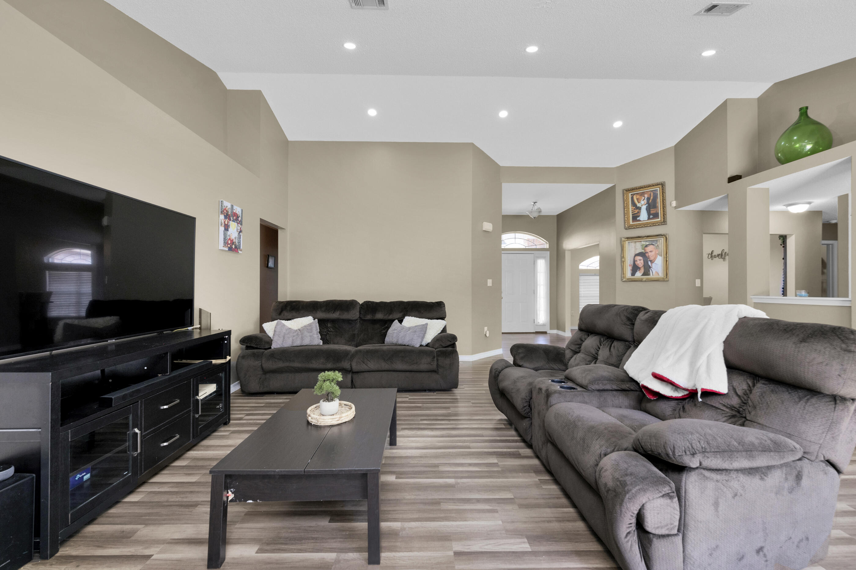 6215 Shire Lane Crestview, FL 32536 - Photo 10 of 36 a living room with furniture and a flat screen tv