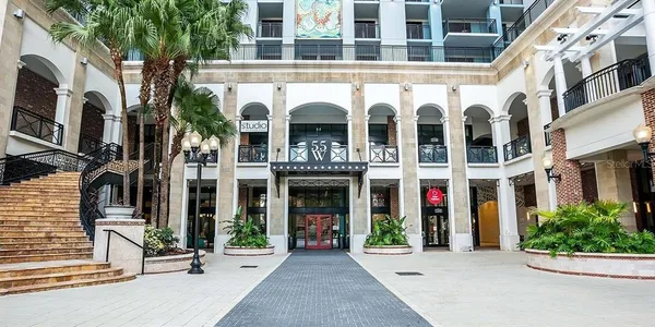 a view of a building with a bench in front of building