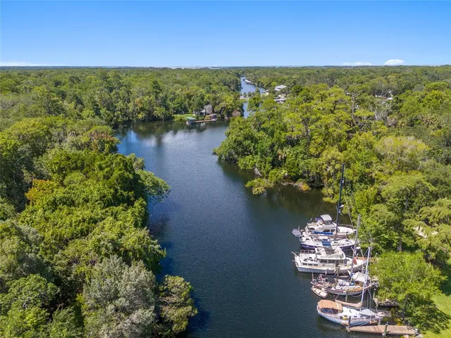 a view of a lake with a yard