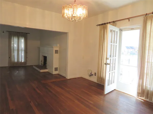 a view of entryway with wooden floor