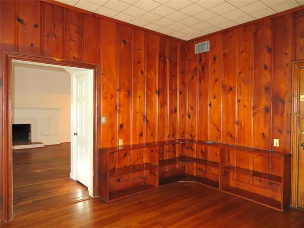 a view of entryway with wooden floor