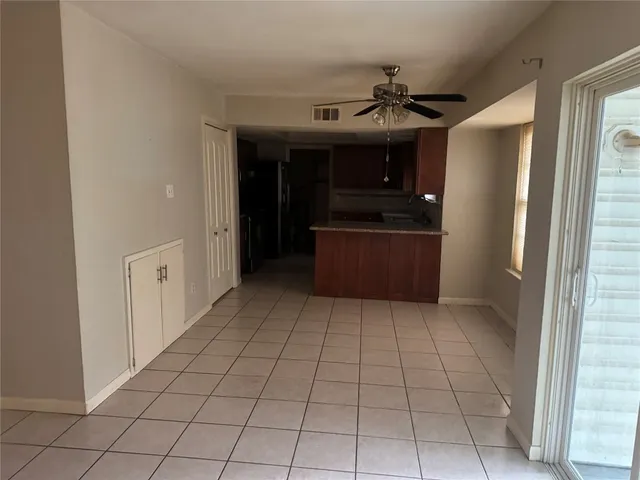 a kitchen with stainless steel appliances granite countertop a sink and cabinets