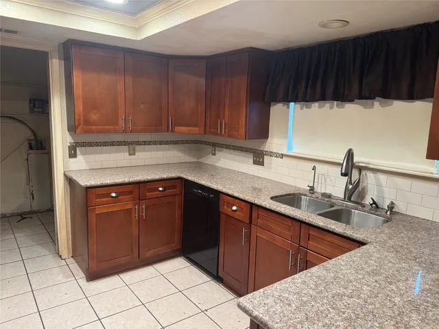 a kitchen with a stove and a microwave