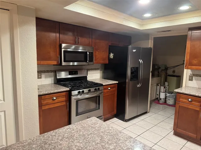 a view of balcony with wooden floor