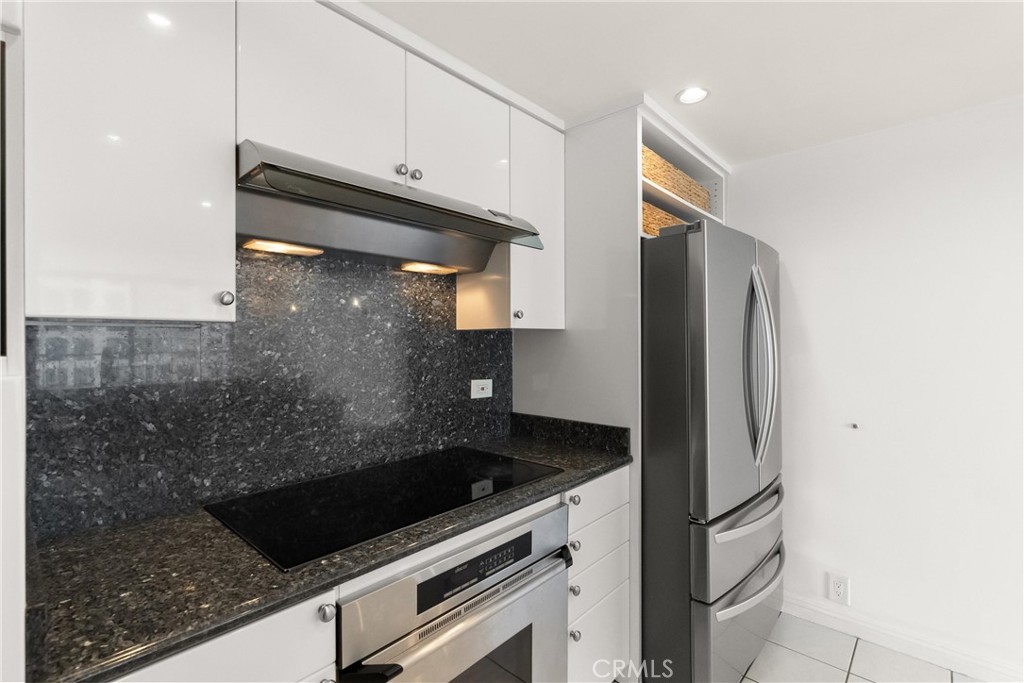 10535 Wilshire Boulevard, Unit 912 Los Angeles, CA 90024 - Photo 16 of 33 a close view of a sink and a stove in the room