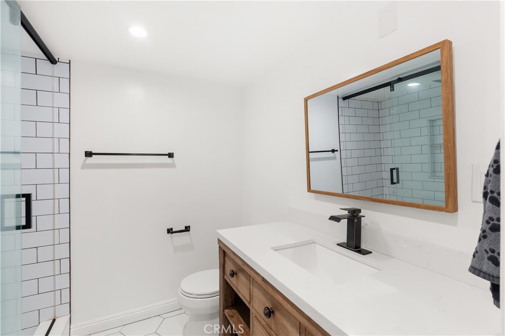 10535 Wilshire Boulevard, Unit 912 Los Angeles, CA 90024 - Photo 21 of 33 a bathroom with a sink and a toilet